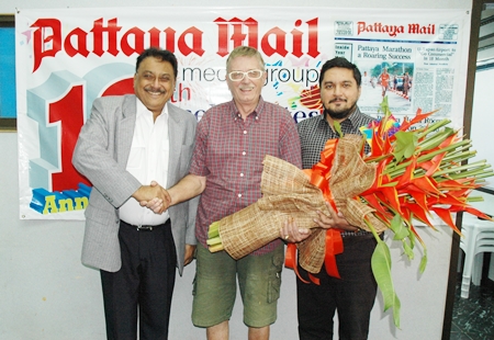 Martin Brands (centre), representing the Rotary Club of Jomtien-Pattaya presented a beautiful bouquet of flowers to Peter and Prince Malhotra recently to congratulate the Pattaya Mail on the historic occasion of reaching a milestone of our 1000th issue of the First and the Best English language newspaper in Pattaya.